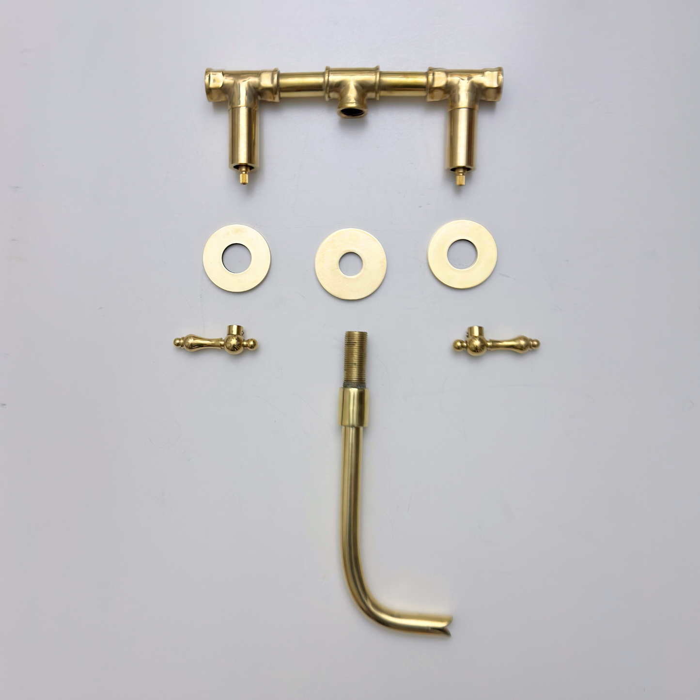 Unlacquered Brass Wall-Mount Sink Faucet with Lever handles